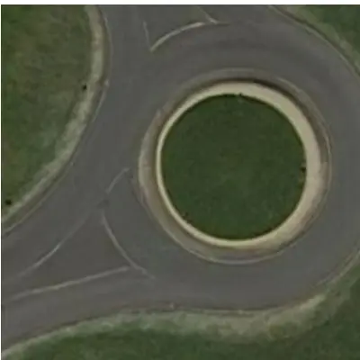 A roundabout surrounded by grass